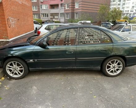 Зеленый Опель Омега, объемом двигателя 2.5 л и пробегом 250 тыс. км за 1157 $, фото 1 на Automoto.ua