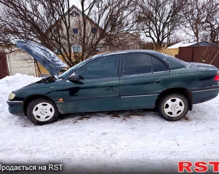 Зеленый Опель Омега, объемом двигателя 2 л и пробегом 280 тыс. км за 1550 $, фото 1 на Automoto.ua