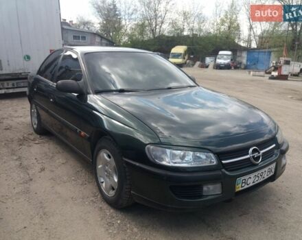 Зеленый Опель Омега, объемом двигателя 2 л и пробегом 330 тыс. км за 2900 $, фото 1 на Automoto.ua