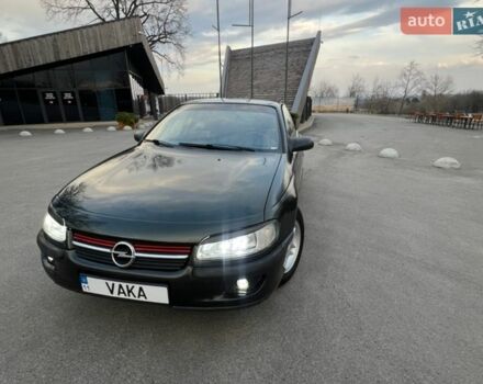 Зеленый Опель Омега, объемом двигателя 2 л и пробегом 270 тыс. км за 2400 $, фото 1 на Automoto.ua