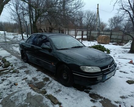 Зеленый Опель Омега, объемом двигателя 2 л и пробегом 300 тыс. км за 1000 $, фото 1 на Automoto.ua