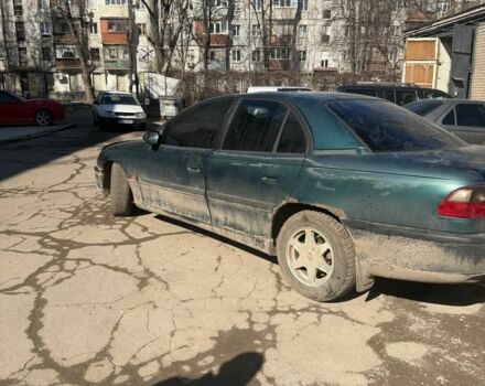 Зеленый Опель Омега, объемом двигателя 2 л и пробегом 250 тыс. км за 700 $, фото 1 на Automoto.ua
