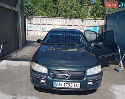 Зеленый Опель Омега, объемом двигателя 2 л и пробегом 252 тыс. км за 2200 $, фото 1 на Automoto.ua