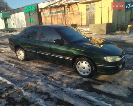 Зеленый Опель Омега, объемом двигателя 2 л и пробегом 383 тыс. км за 2100 $, фото 1 на Automoto.ua