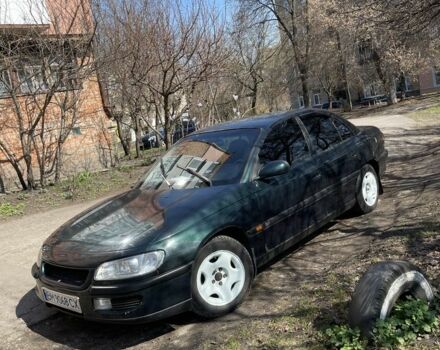 Зеленый Опель Омега, объемом двигателя 3 л и пробегом 290 тыс. км за 2500 $, фото 1 на Automoto.ua