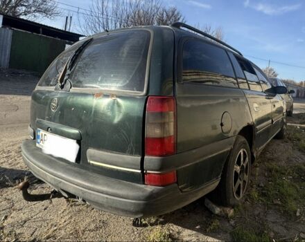Зеленый Опель Омега, объемом двигателя 2 л и пробегом 300 тыс. км за 370 $, фото 1 на Automoto.ua