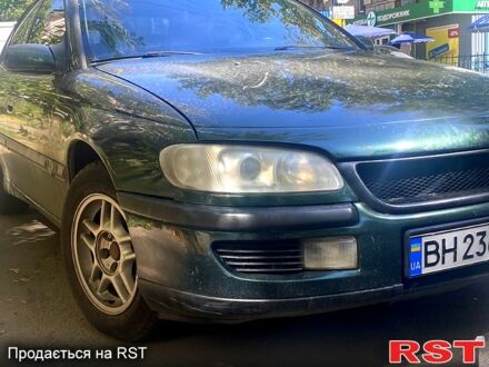 Зеленый Опель Омега, объемом двигателя 2.5 л и пробегом 412 тыс. км за 2900 $, фото 1 на Automoto.ua