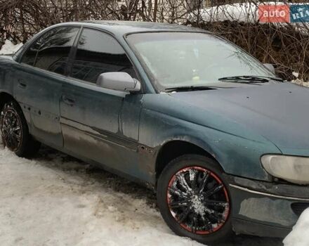 Зелений Опель Омега, об'ємом двигуна 2 л та пробігом 400 тис. км за 1300 $, фото 1 на Automoto.ua