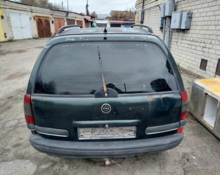 Зеленый Опель Омега, объемом двигателя 2 л и пробегом 300 тыс. км за 350 $, фото 1 на Automoto.ua