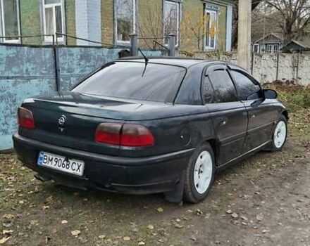Зеленый Опель Омега, объемом двигателя 3 л и пробегом 350 тыс. км за 2031 $, фото 1 на Automoto.ua