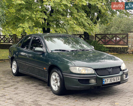 Зеленый Опель Омега, объемом двигателя 2 л и пробегом 300 тыс. км за 1750 $, фото 1 на Automoto.ua