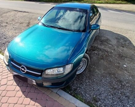 Зеленый Опель Омега, объемом двигателя 2 л и пробегом 500 тыс. км за 2100 $, фото 1 на Automoto.ua