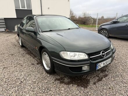 Зеленый Опель Омега, объемом двигателя 2 л и пробегом 397 тыс. км за 2500 $, фото 1 на Automoto.ua