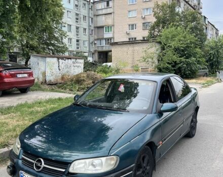 Зеленый Опель Омега, объемом двигателя 2 л и пробегом 550 тыс. км за 1300 $, фото 1 на Automoto.ua