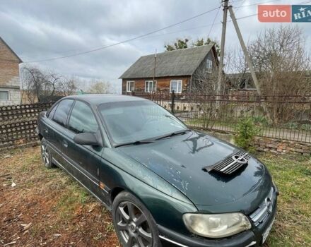 Зеленый Опель Омега, объемом двигателя 2 л и пробегом 200 тыс. км за 850 $, фото 1 на Automoto.ua