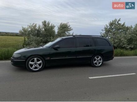 Зелений Опель Омега, об'ємом двигуна 2 л та пробігом 380 тис. км за 2210 $, фото 1 на Automoto.ua