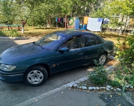 Зеленый Опель Омега, объемом двигателя 1.9 л и пробегом 250 тыс. км за 1800 $, фото 1 на Automoto.ua