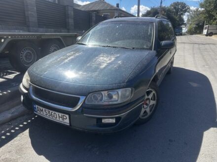 Зеленый Опель Омега, объемом двигателя 2 л и пробегом 200 тыс. км за 604 $, фото 1 на Automoto.ua