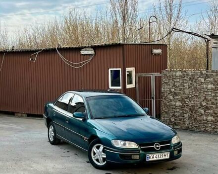 Зеленый Опель Омега, объемом двигателя 2 л и пробегом 331 тыс. км за 2400 $, фото 1 на Automoto.ua
