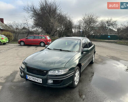 Зеленый Опель Омега, объемом двигателя 2.96 л и пробегом 345 тыс. км за 3000 $, фото 1 на Automoto.ua