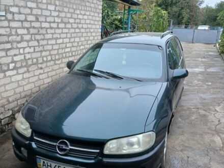 Зеленый Опель Омега, объемом двигателя 2 л и пробегом 350 тыс. км за 2200 $, фото 1 на Automoto.ua
