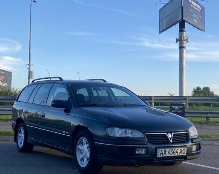 Зелений Опель Омега, об'ємом двигуна 2 л та пробігом 350 тис. км за 1500 $, фото 1 на Automoto.ua