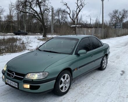 Зеленый Опель Омега, объемом двигателя 2 л и пробегом 279 тыс. км за 2500 $, фото 1 на Automoto.ua