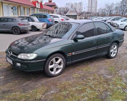 Зеленый Опель Омега, объемом двигателя 2 л и пробегом 228 тыс. км за 3000 $, фото 1 на Automoto.ua