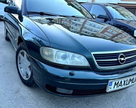 Зеленый Опель Омега, объемом двигателя 2.5 л и пробегом 468 тыс. км за 4000 $, фото 1 на Automoto.ua