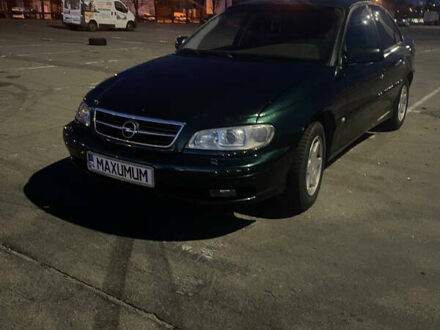 Зеленый Опель Омега, объемом двигателя 2.5 л и пробегом 425 тыс. км за 5000 $, фото 1 на Automoto.ua