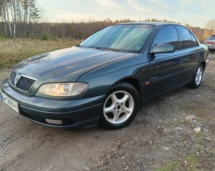 Зеленый Опель Омега, объемом двигателя 2.5 л и пробегом 344 тыс. км за 2250 $, фото 1 на Automoto.ua