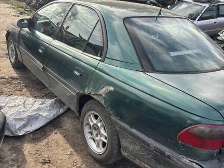 Зеленый Опель Омега, объемом двигателя 2 л и пробегом 425 тыс. км за 600 $, фото 1 на Automoto.ua