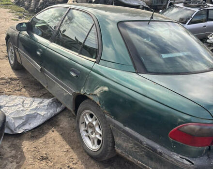 Зеленый Опель Омега, объемом двигателя 2 л и пробегом 425 тыс. км за 600 $, фото 1 на Automoto.ua