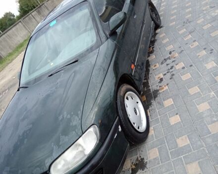 Зеленый Опель Омега, объемом двигателя 2 л и пробегом 300 тыс. км за 617 $, фото 1 на Automoto.ua