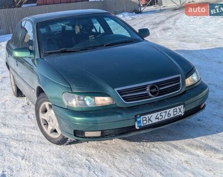Зеленый Опель Омега, объемом двигателя 2.2 л и пробегом 250 тыс. км за 1500 $, фото 1 на Automoto.ua