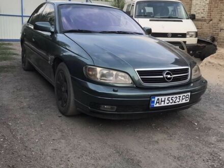 Опель Омега 2001 в Краматорске на Automoto.ua Зеленый Опель Омега, объемом двигателя 2.2 л и пробегом 230 тыс. км за 2800 $, фото 1 на Automoto.ua