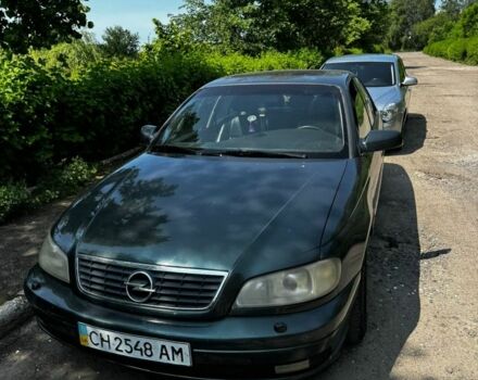 Зеленый Опель Омега, объемом двигателя 2.2 л и пробегом 369 тыс. км за 1000 $, фото 1 на Automoto.ua