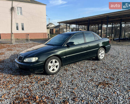 Зеленый Опель Омега, объемом двигателя 2.2 л и пробегом 350 тыс. км за 2500 $, фото 1 на Automoto.ua