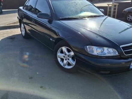 Зеленый Опель Омега, объемом двигателя 2.2 л и пробегом 280 тыс. км за 2600 $, фото 1 на Automoto.ua