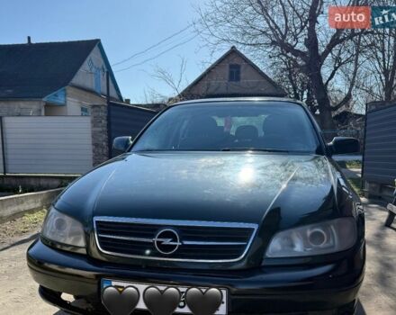 Зеленый Опель Омега, объемом двигателя 2.2 л и пробегом 256 тыс. км за 4000 $, фото 1 на Automoto.ua