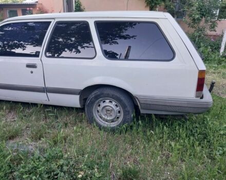 Белый Опель Рекорд, объемом двигателя 1.8 л и пробегом 350 тыс. км за 450 $, фото 1 на Automoto.ua