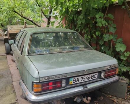 Зеленый Опель Рекорд, объемом двигателя 2 л и пробегом 250 тыс. км за 490 $, фото 1 на Automoto.ua
