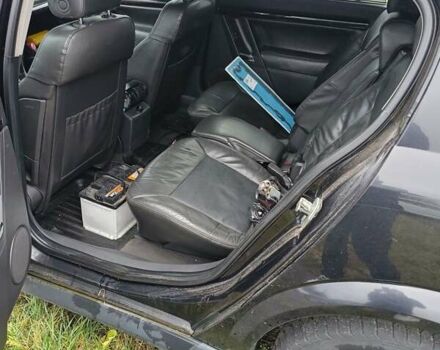 Черный Опель Сигнум, объемом двигателя 2.2 л и пробегом 370 тыс. км за 2000 $, фото 7 на Automoto.ua