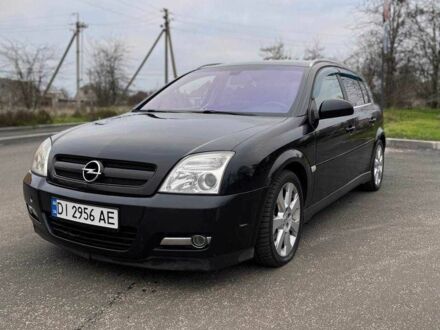 Черный Опель Сигнум, объемом двигателя 2.2 л и пробегом 297 тыс. км за 4600 $, фото 1 на Automoto.ua