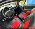 Черный Опель Тигра, объемом двигателя 1.4 л и пробегом 220 тыс. км за 2600 $, фото 7 на Automoto.ua