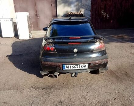 Чорний Опель Тігра, об'ємом двигуна 1.4 л та пробігом 320 тис. км за 2200 $, фото 5 на Automoto.ua