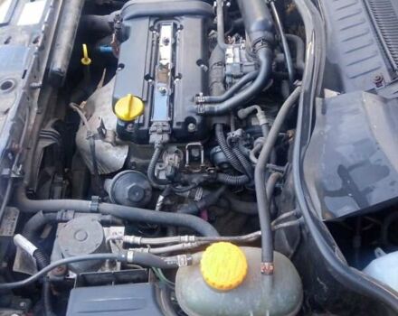 Черный Опель Тигра, объемом двигателя 1.4 л и пробегом 164 тыс. км за 5000 $, фото 4 на Automoto.ua