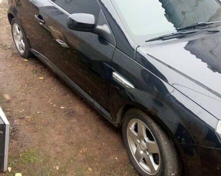 Черный Опель Тигра, объемом двигателя 1.4 л и пробегом 164 тыс. км за 5000 $, фото 1 на Automoto.ua