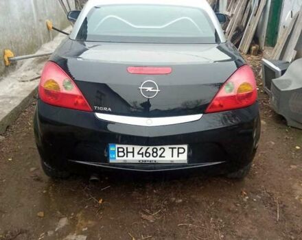 Черный Опель Тигра, объемом двигателя 1.4 л и пробегом 164 тыс. км за 5000 $, фото 3 на Automoto.ua