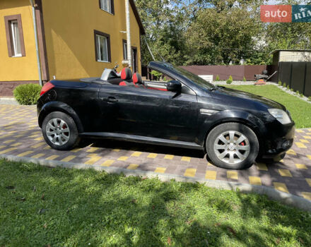 Черный Опель Тигра, объемом двигателя 1.4 л и пробегом 200 тыс. км за 3300 $, фото 3 на Automoto.ua